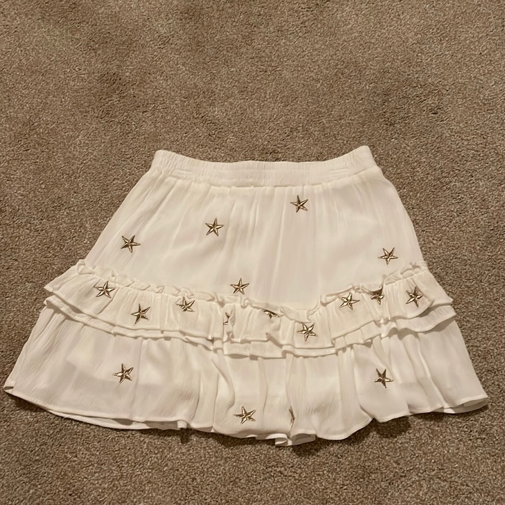 White skirt with gold stars